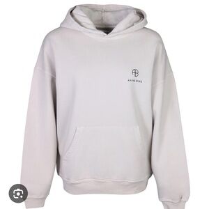 Anine Bing oversized, distressed ‘Aiden’ Hoodie in color stone.